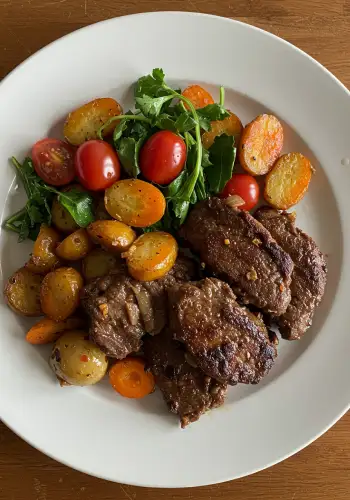 Hearty beef dinner served in a glass with rich color and mint garnish – ideal for savory meals